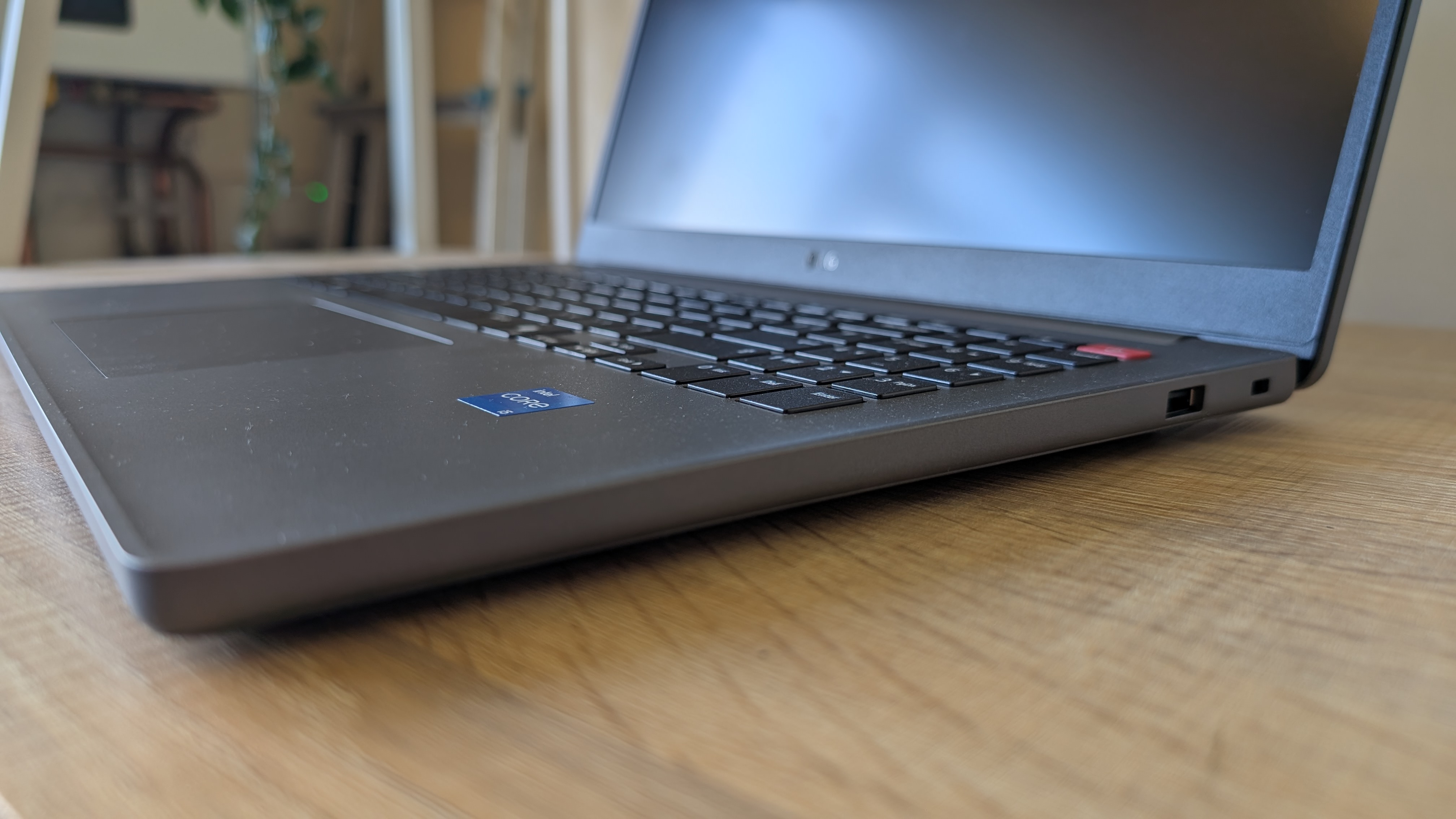 The LG Gram Book laptop pictured on a wooden desk.