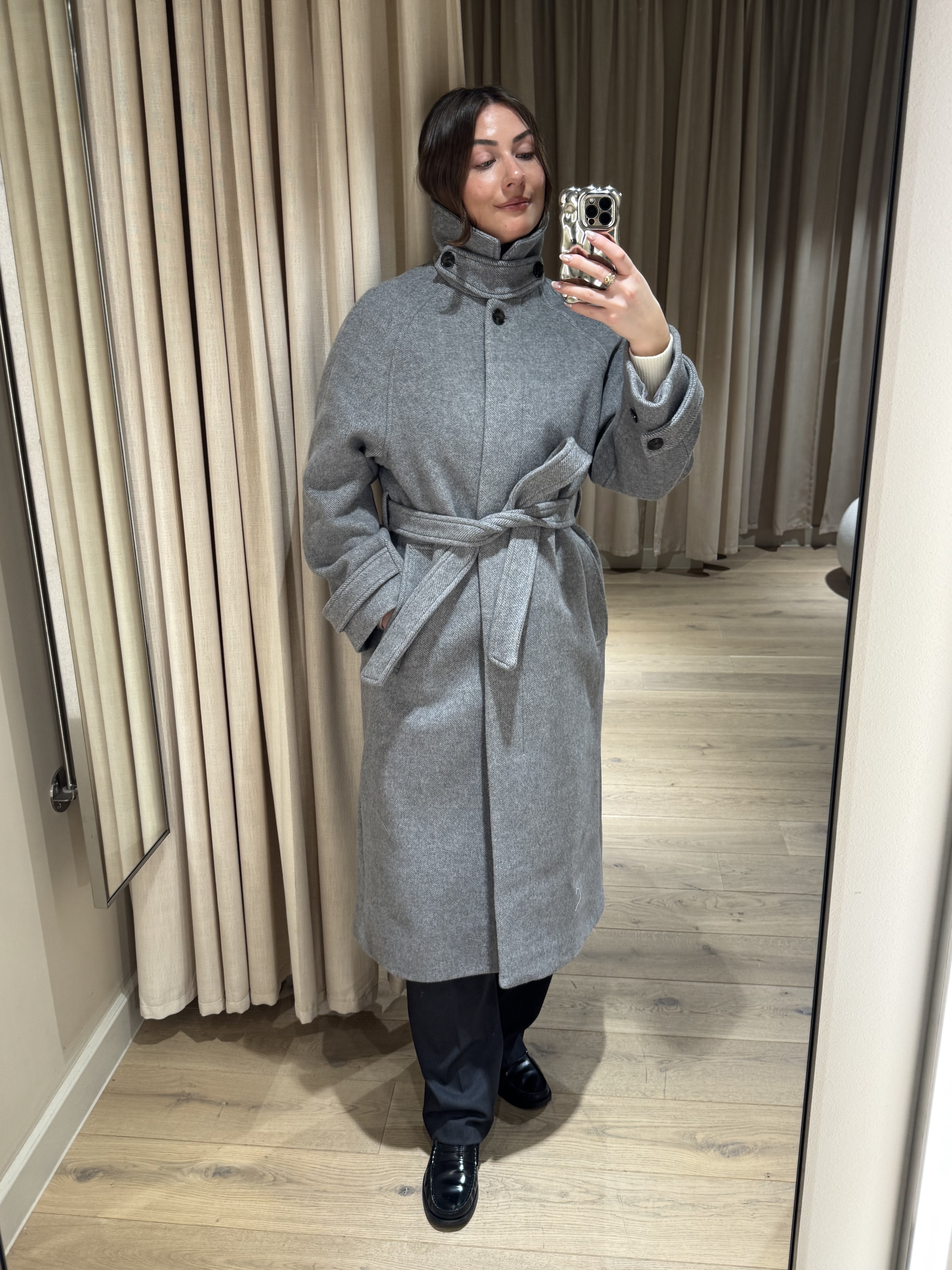 Sophie Robyn Watson wearing a coat from H&amp;amp;M.