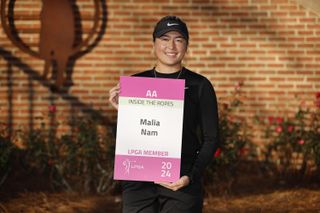 Malia Nam holds up her Epson Tour card