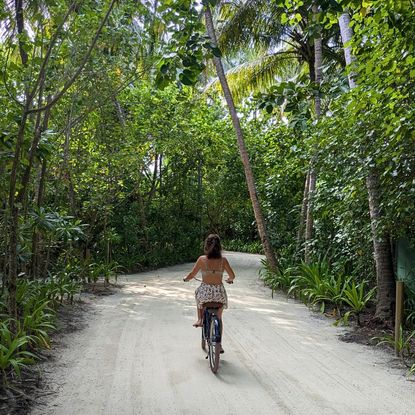 Lydia Swinscoe cycling during a solo trip