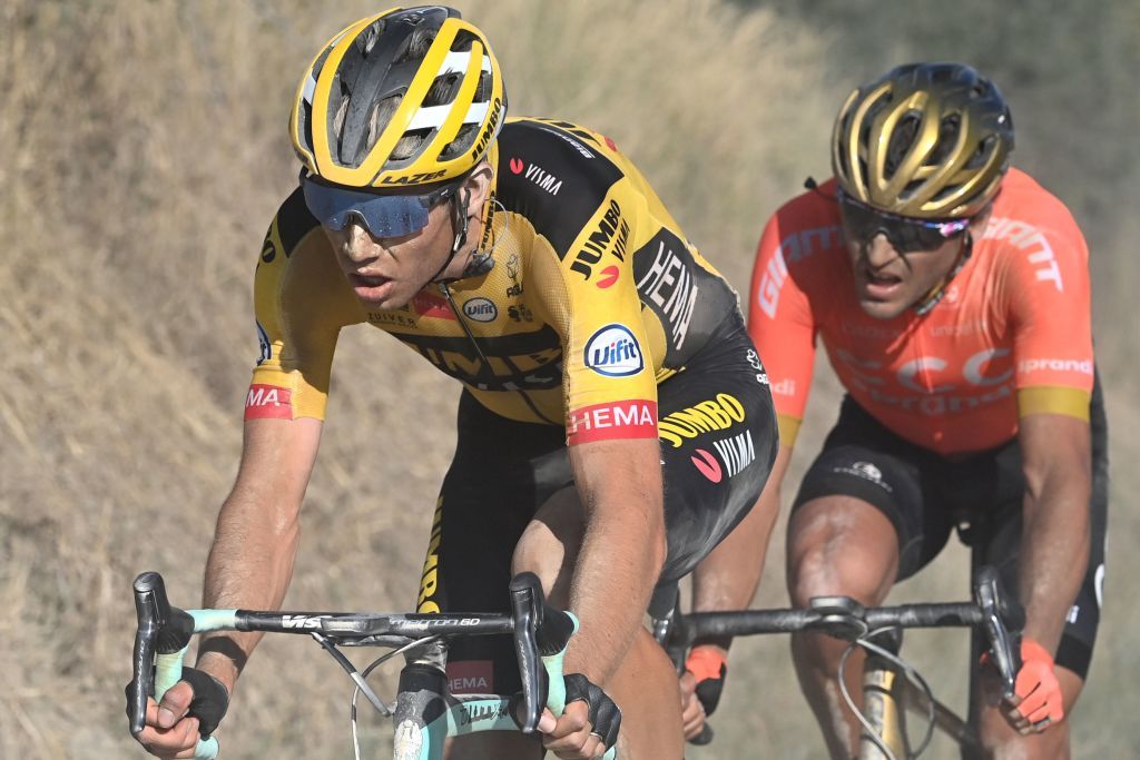 Team JumboVisma Belgian rider Wout van Aert L and CCC Team rider Belgian Greg Van Avermaet pedal during a break away through a dusty gravel road in the oneday classic cycling race Strade Bianche White Roads on August 1 2020 around Siena Tuscany Photo by Marco BERTORELLO AFP Photo by MARCO BERTORELLOAFP via Getty Images