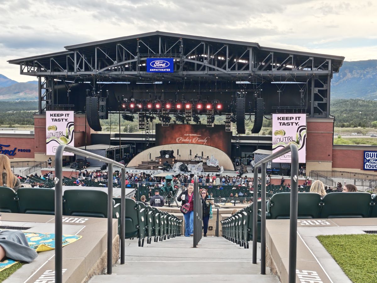 Photos of a stage at an outdoor concert