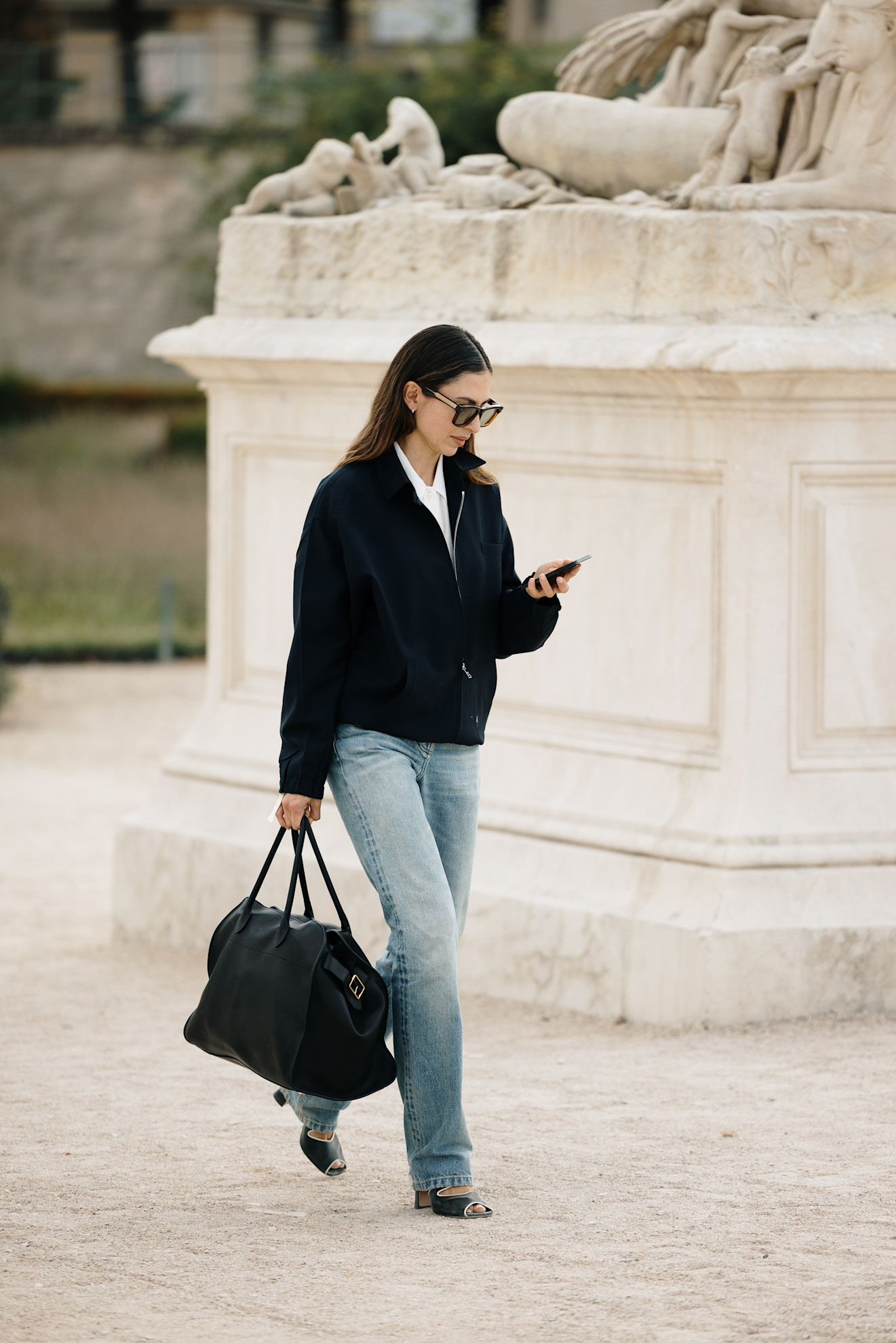 woman wearing sweater and jeans