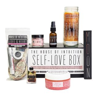 box set with candle, oil, sage, bath salts, and more