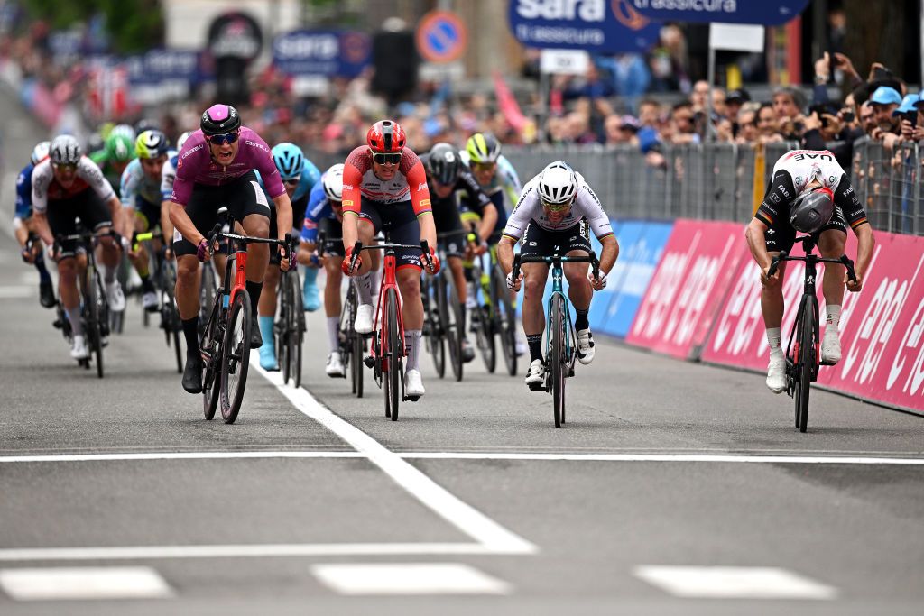 TORTONA ITALY MAY 17 LR Jonathan Milan of Italy and Team Bahrain Victorious Purple Points Jersey Mads Pedersen of Denmark and Team Trek Segafredo Mark Cavendish of The United Kingdom and Astana Qazaqstan Team and Pascal Ackermann of Germany and UAE Team Emirates sprint at finish line during the 106th Giro dItalia 2023 Stage 11 a 219km stage from Camaiore to Tortona UCIWT on May 17 2023 in Tortona Italy Photo by Stuart FranklinGetty Images