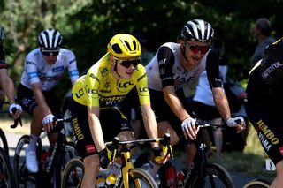 BOURGENBRESSE FRANCE JULY 20 LR Jonas Vingegaard of Denmark and Team JumboVisma Yellow leader jersey and Mikkel Bjerg of Denmark and UAE Team Emirates compete during the stage eighteen of the 110th Tour de France 2023 a 1849km stage from Motiers to BourgenBresse UCIWT on July 20 2023 in BourgenBresse France Photo by Michael SteeleGetty Images