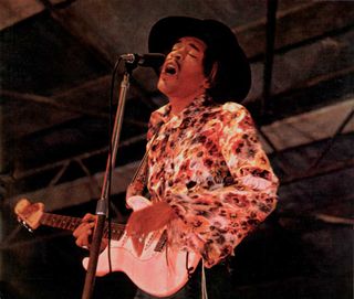 Jimi Hendrix performs on stage at Woburn Pop Festival, Woburn Abbey, UK, August 1968