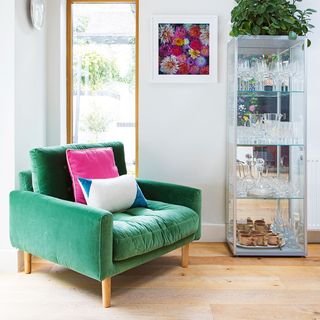 Scandi living room with green chair