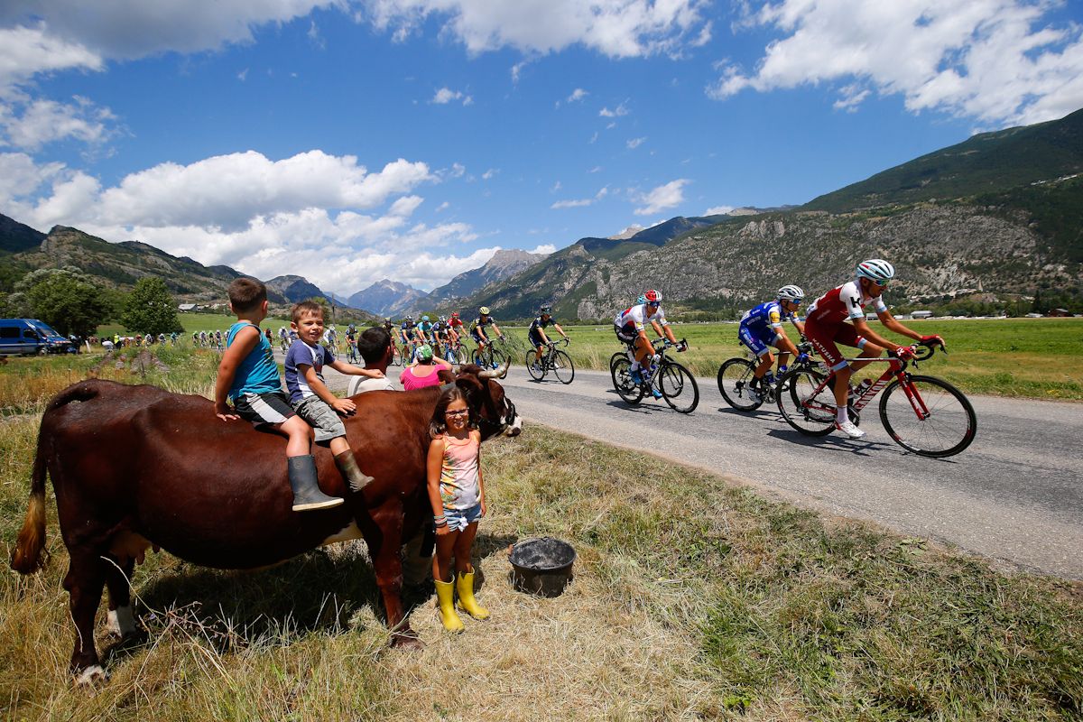 Spectcators get a unique seat during stage 18 at the Tour de France