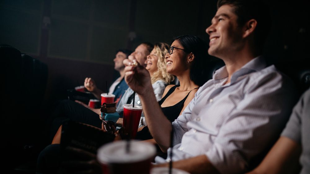 People watching a film in a cinema