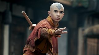 Aang putting his left hand out in caution in the live-action Avatar: The Last Airbender. 