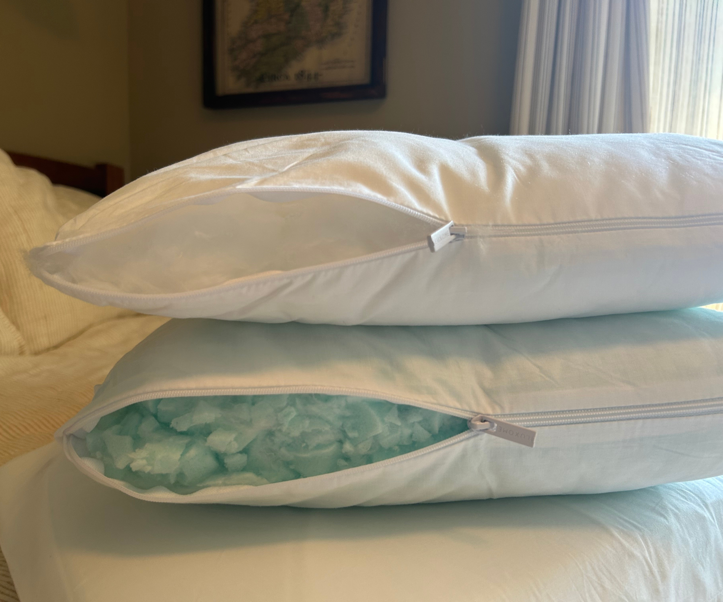 two pillows unzipped to reveal inner materials