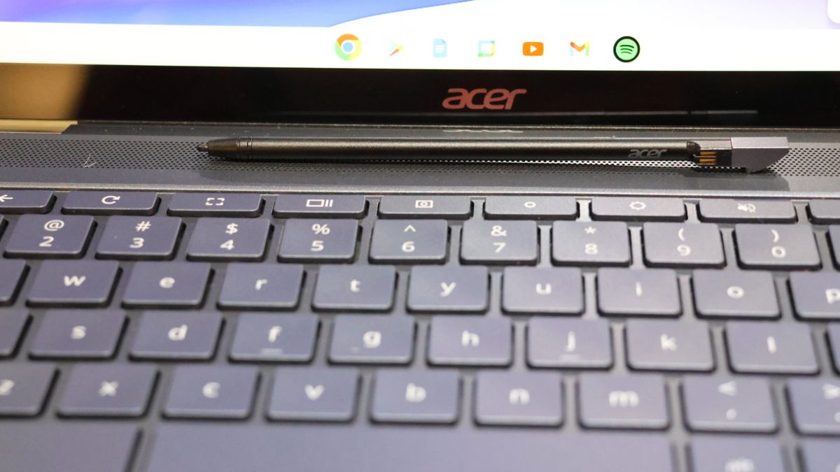 Close-up of a stylus resting on the Acer Chromebook Spin 714's keyboard.