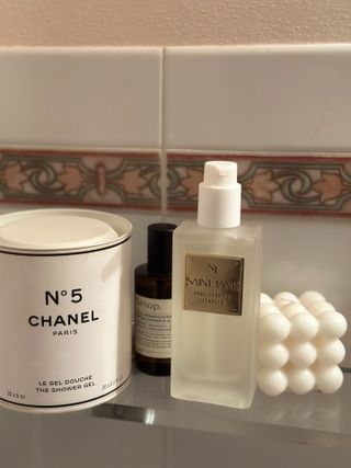 The Saint Jane Pore Clarity Hyaluronic + Flower Acid Cleanser on Marisa's vanity