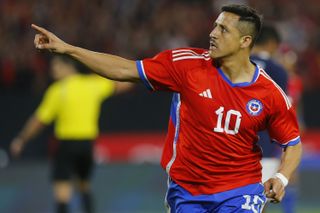 Alexis Sanchez celebrates after scoring for Chile against Paraguay in March 2023.