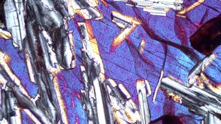 As seen under a microscope, a basalt inclusion in a ceramic tile from Gordion, an ancient site in what is now Turkey.