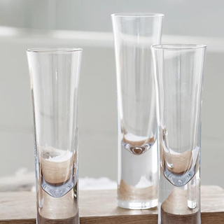 Three stemless champagne glasses