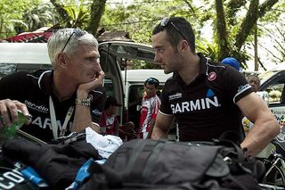 Nathan Haas (right) engages his Garmin Barracuda team-manager Allan Peiper in a conversation prior to the final stage of the tour.