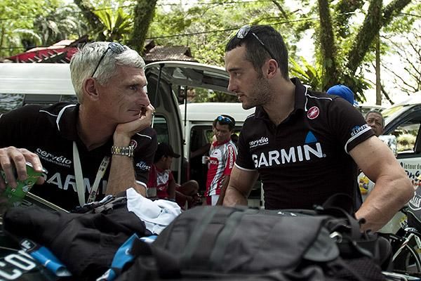 Nathan Haas (right) engages his Garmin Barracuda team-manager Allan Peiper in a conversation prior to the final stage of the tour.
