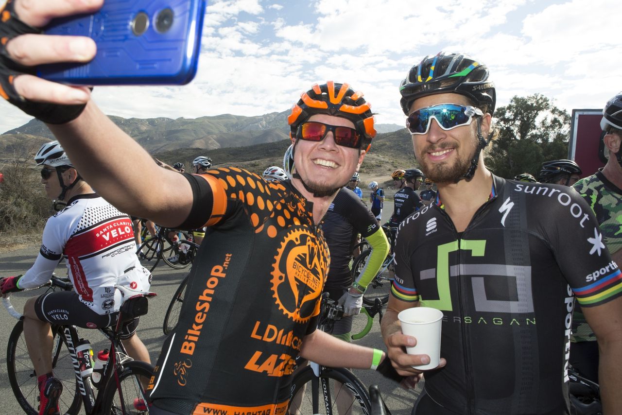 A fan takes a selfie with world champion Peter Sagan