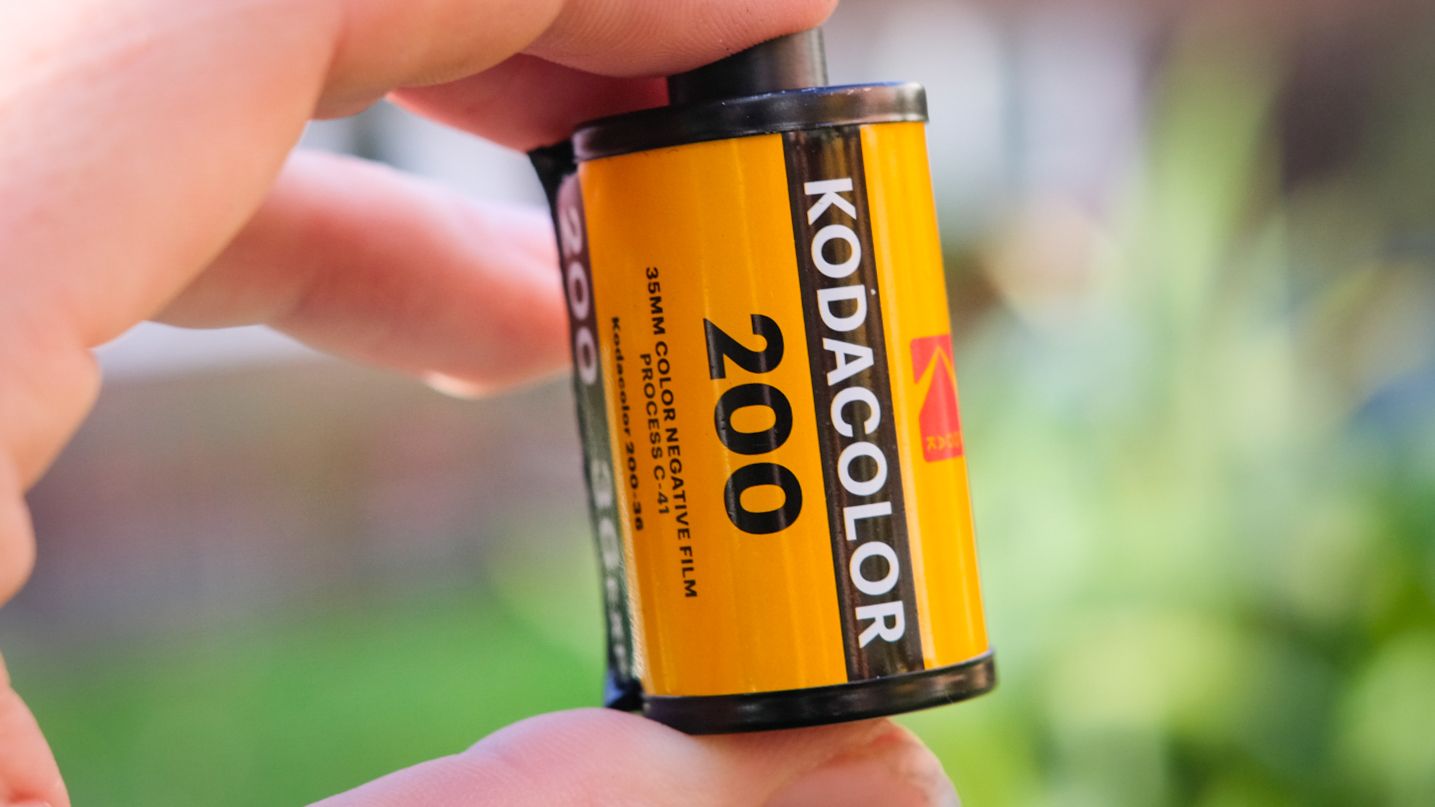 Roll of Kodak Kodacolor film held between person's finger and thumb