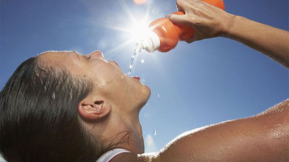 woman with water bottle