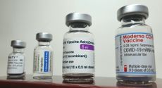 Various vials of COVID-19 vaccines.