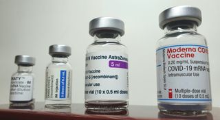 Various vials of COVID-19 vaccines.