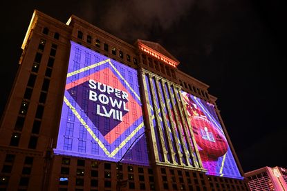 Super Bowl LVIII logo projected on the side of Caesers Palace in Las Vegas