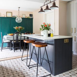 kitchen with tiled floor and island