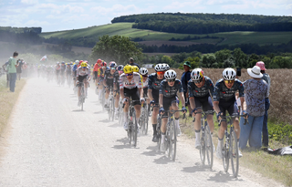 Visma-Lease a Bike led the peloton when they reached the white gravel roads