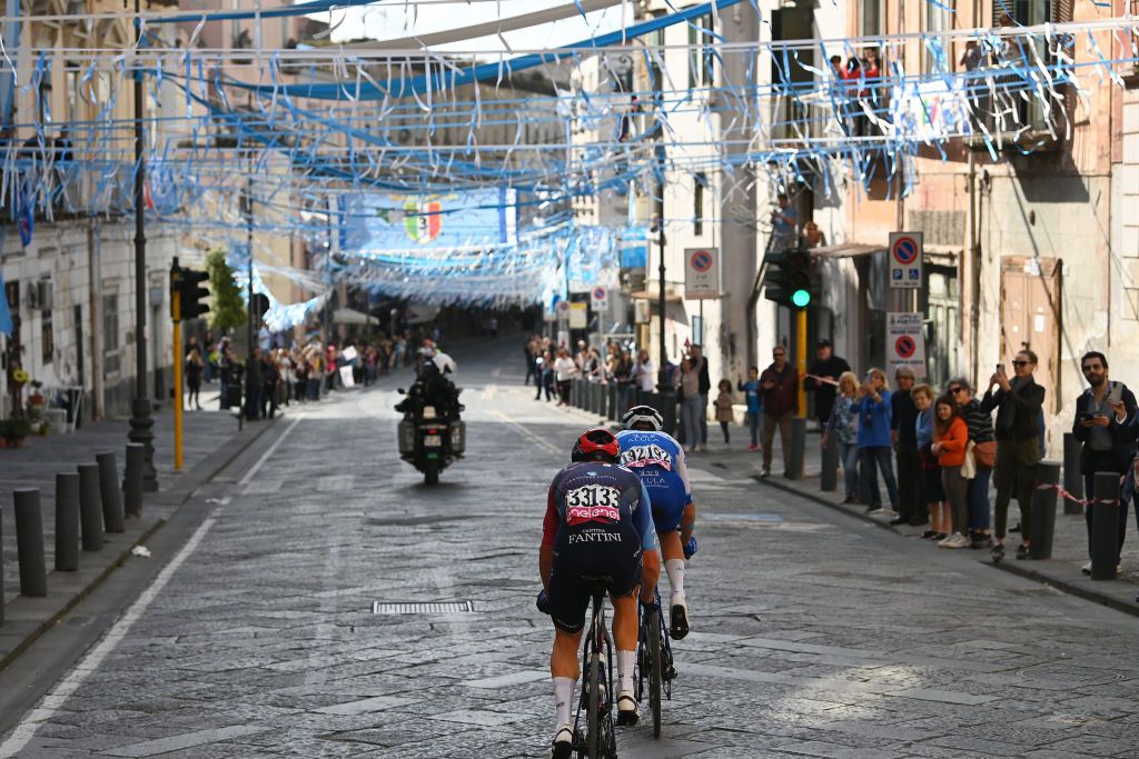 NAPLES ITALY MAY 11 Simon Clarke of Australia and Team Israel Premier Tech and Alessandro De Marchi of Italy and Team Jayco AlUla compete in the breakaway passing through Naples ity while fans cheer during the 106th Giro dItalia 2023 Stage 6 a 162km stage from Naples to Naples UCIWT on May 11 2023 in Naples Italy Photo by Tim de WaeleGetty Images