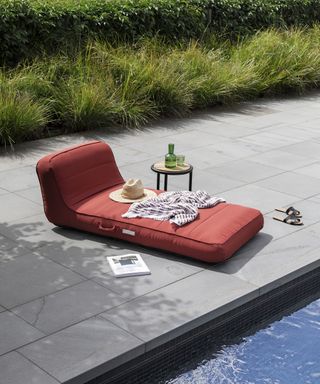 float on poolside deck with accessories