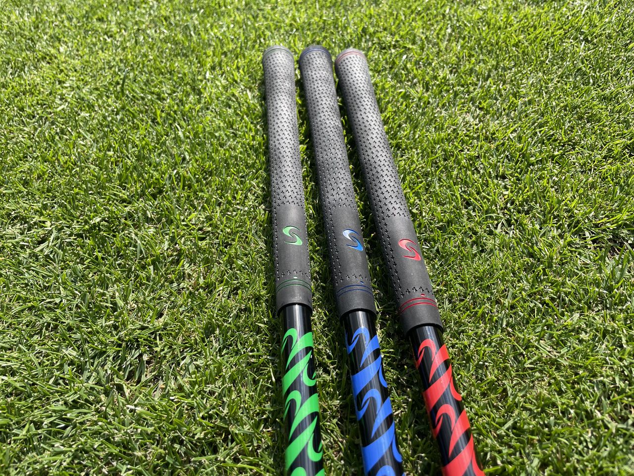 The grips on the three sticks in the SuperSpeed Men's training set