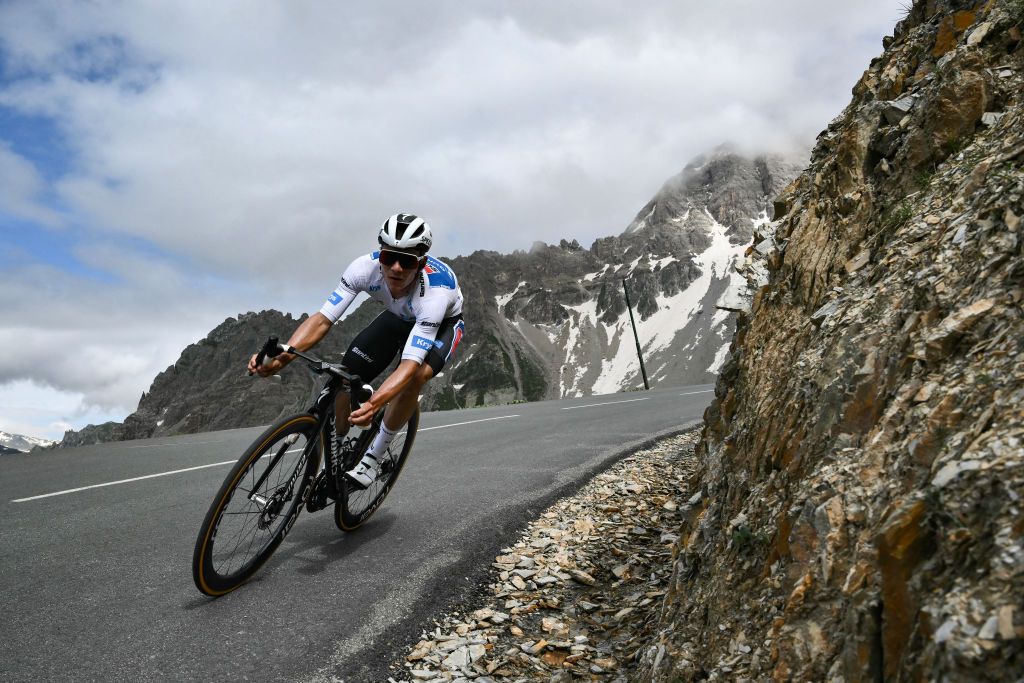 Soudal Quick-Step team's Belgian rider Remco Evenepoel cycles in the Galibier descent during the 4th stage of the 111th edition of the Tour de France cycling race, 140 km between Pinerolo in Italy, and Valloire in France, on July 2, 2024. (Photo by Marco BERTORELLO / AFP)