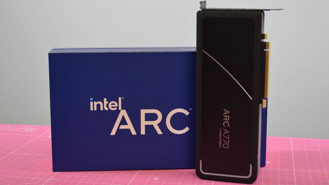 An Intel Arc A770 LE graphics card on a table with a pink desk mat