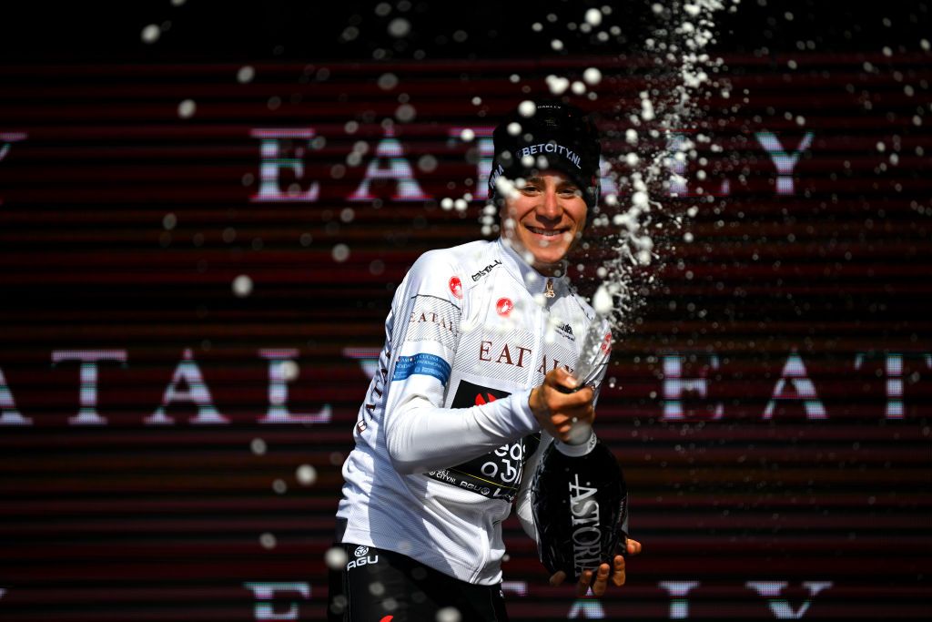 PRATI DI TIVO ITALY MAY 11 Cian Uijtdebroeks of Belgium and Team Visma Lease a Bike celebrates at podium as White best young jersey winner during the 107th Giro dItalia 2024 Stage 8 a 152km stage from Spoleto to Prati di Tivo 1451m UCIWT on May 11 2024 in Prati di Tivo Italy Photo by Dario BelingheriGetty Images