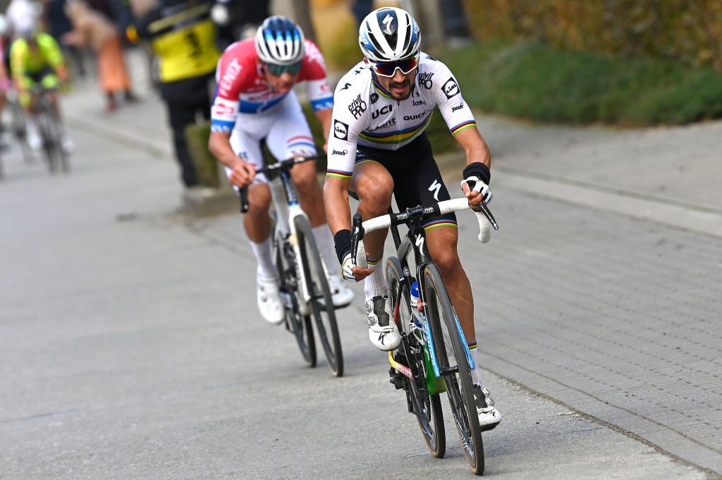 OUDENAARDE BELGIUM OCTOBER 18 Julian Alaphilippe of France and Team Deceuninck QuickStep World Champion Jersey Mathieu Van Der Poel of The Netherlands and Team AlpecinFenix Breakaway during the 104th Tour of Flanders 2020 Ronde van Vlaanderen Men Elite a 2433km race from Antwerpen to Oudenaarde RVV20 FlandersClassic on October 18 2020 in Oudenaarde Belgium Photo by Nico Vereecken PoolGetty Images