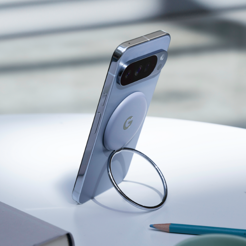 Pixelsnap Ring Stand propping up a Pixel 10 on a table