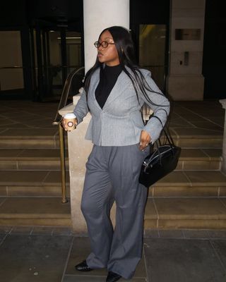 Nnenna wearing wide leg trousers