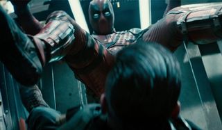 Dedapool crashing into Cable crotch first in Deadpool 2