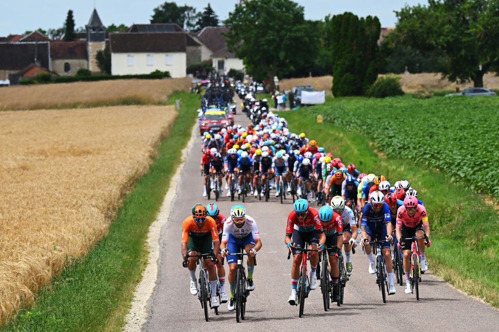 TROYES FRANCE JULY 07 Michael Matthews of Australia and Team Jayco AlUla Anthony Turgis of France and Team TotalEnergies and Brent Van Moer of Belgium and Team Lotto Dstny lead the peloton during the 111th Tour de France 2024 Stage 9 a 199km stage from Troyes to Troyes UCIWT on July 07 2024 in Troyes France Photo by Tim de WaeleGetty Images