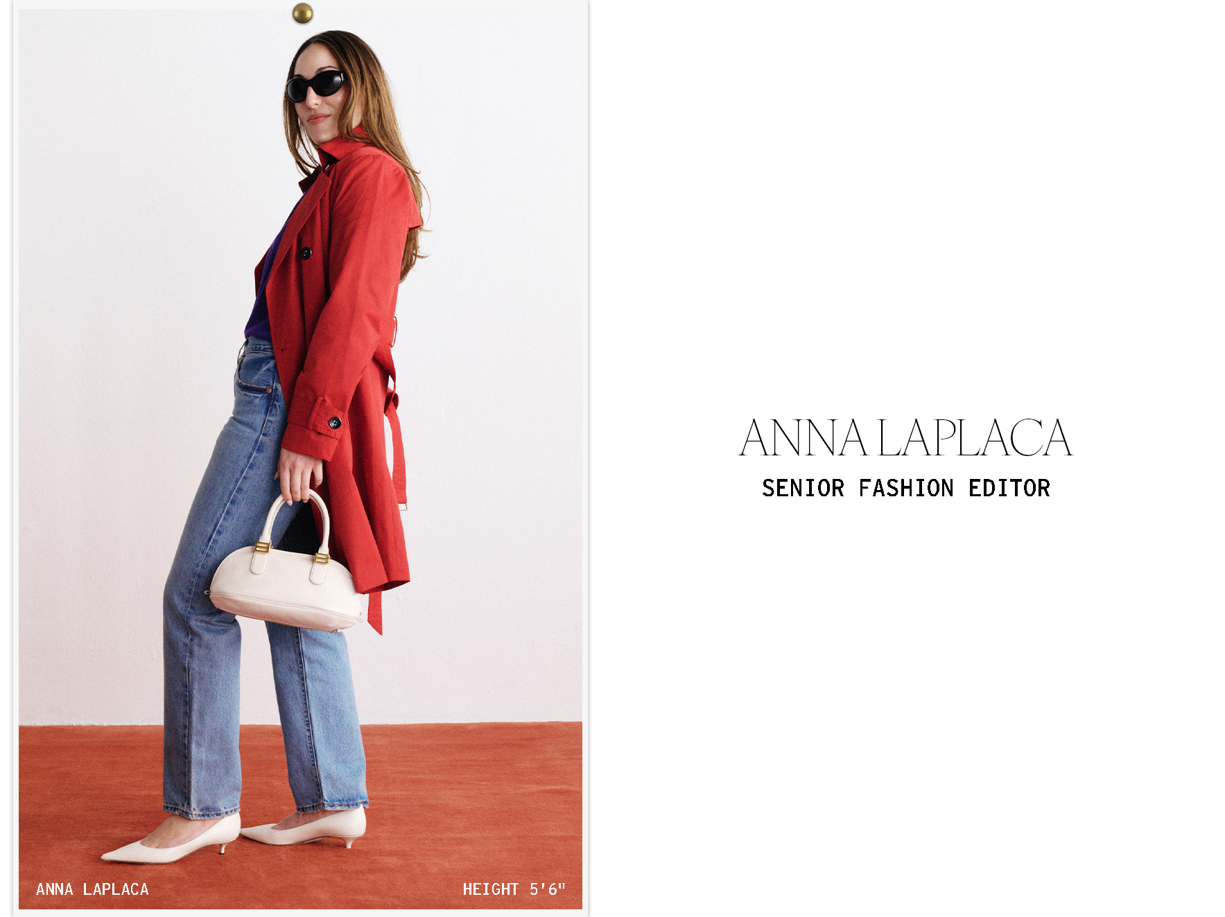 Anna wears a red trench coat and jeans.