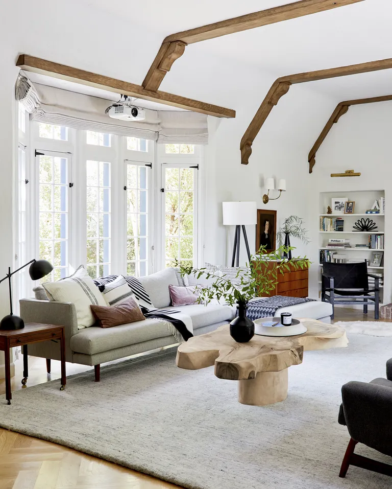 Living room with wooden beams and rustic decor