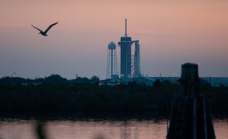 A SpaceX Falcon 9 rocket stands ready to launch a Crew Dragon spacecraft with NASA astronauts Bob Behnknen and Doug Hurley from Pad 39A of NASA's Kennedy Space Center in Cape Canaveral, Florida on May 27, 2020.