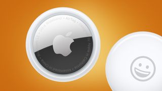 Two Apple AirTags on an orange background