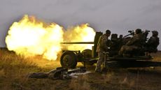 Ukrainian forces fire howitzer