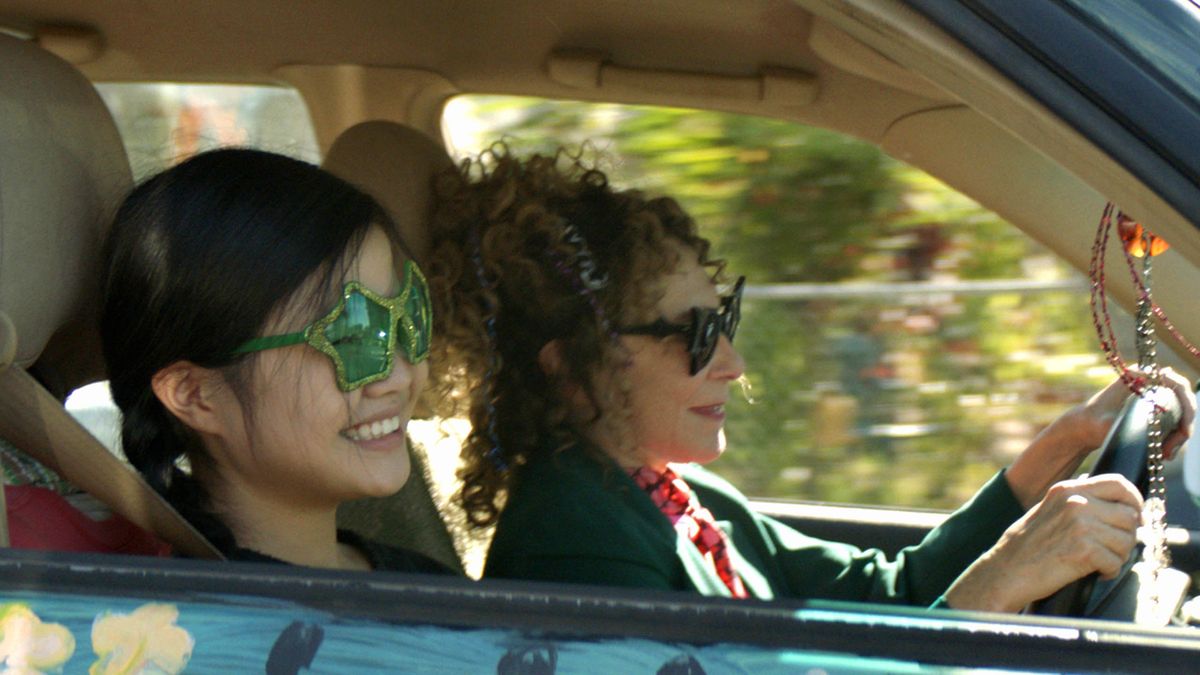 Sammy and Margot laughing in the car