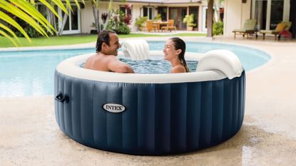 Black Friday hot tub deals: Intex PureSpa Plus 4 Person Portable Inflatable Hot Tub Bubble Jet Spa in garden by pool