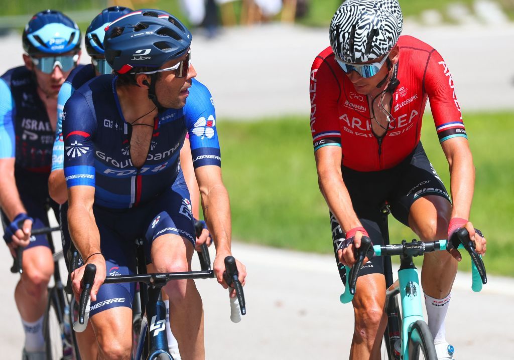 Groupama FDJs French rider Thibaut Pinot C and Team Arkea Samsics French rider Warren Barguil R ride in a breakaway in the eighteenth stage of the Giro dItalia 2023 cycling race 161 km between Oderzo and Val di Zoldo on May 25 2023 Photo by Luca Bettini AFP Photo by LUCA BETTINIAFP via Getty Images